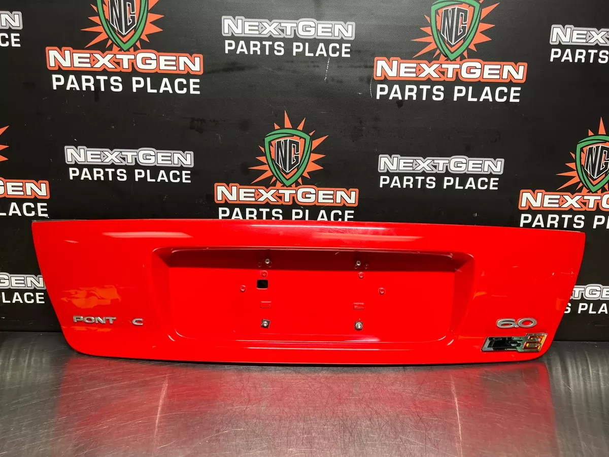04-06 PONTIAC GTO LICENSE PLATE TRUNK FILLER PANEL TORRID RED OEM#1025